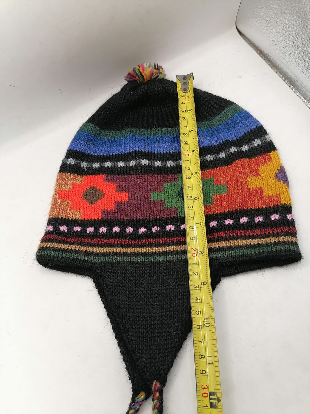Unisex Knitted Wool Chullo for Warm Winter in Cusco with Inca Chakana