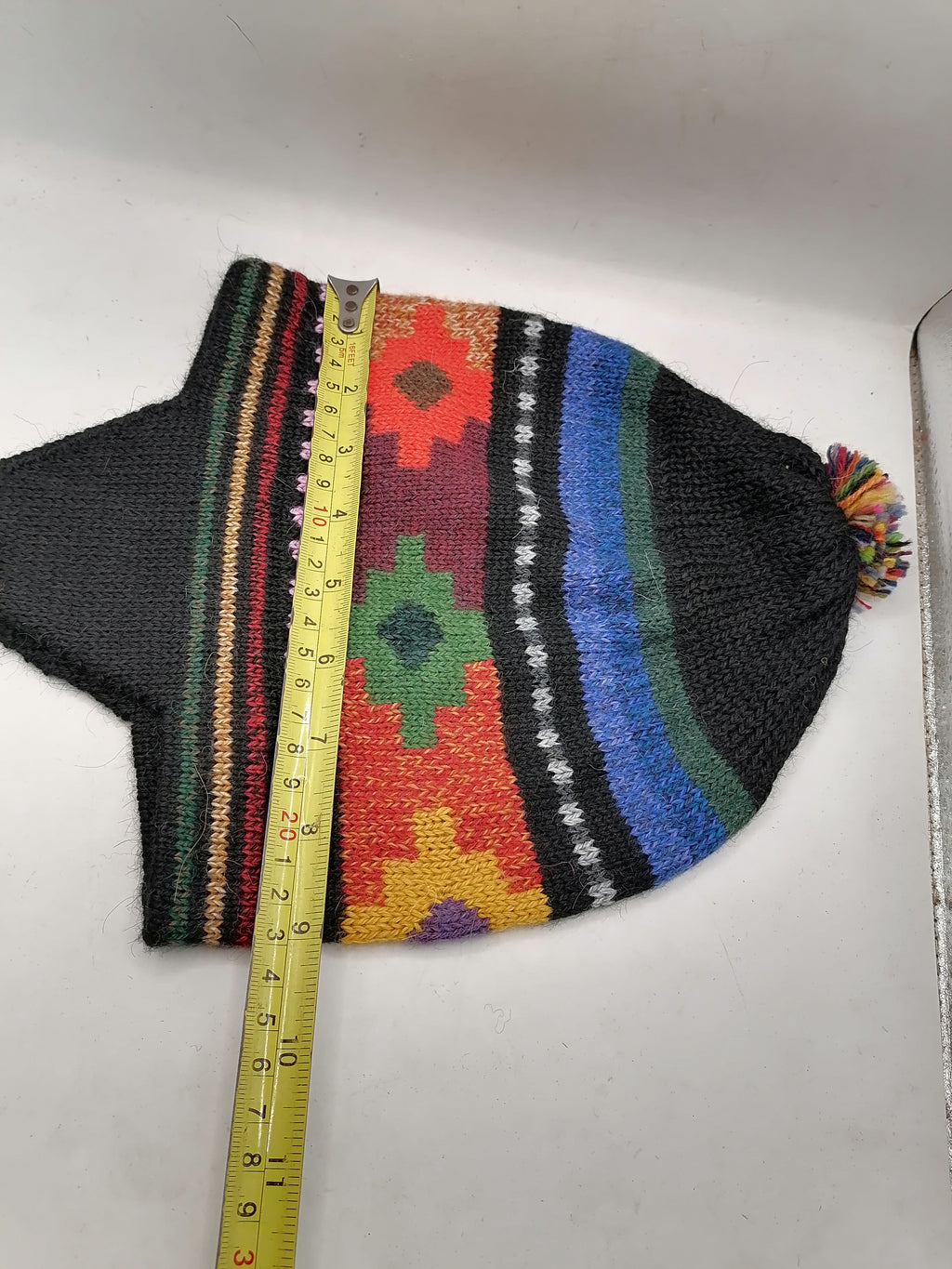 Unisex Knitted Wool Chullo for Warm Winter in Cusco with Inca Chakana