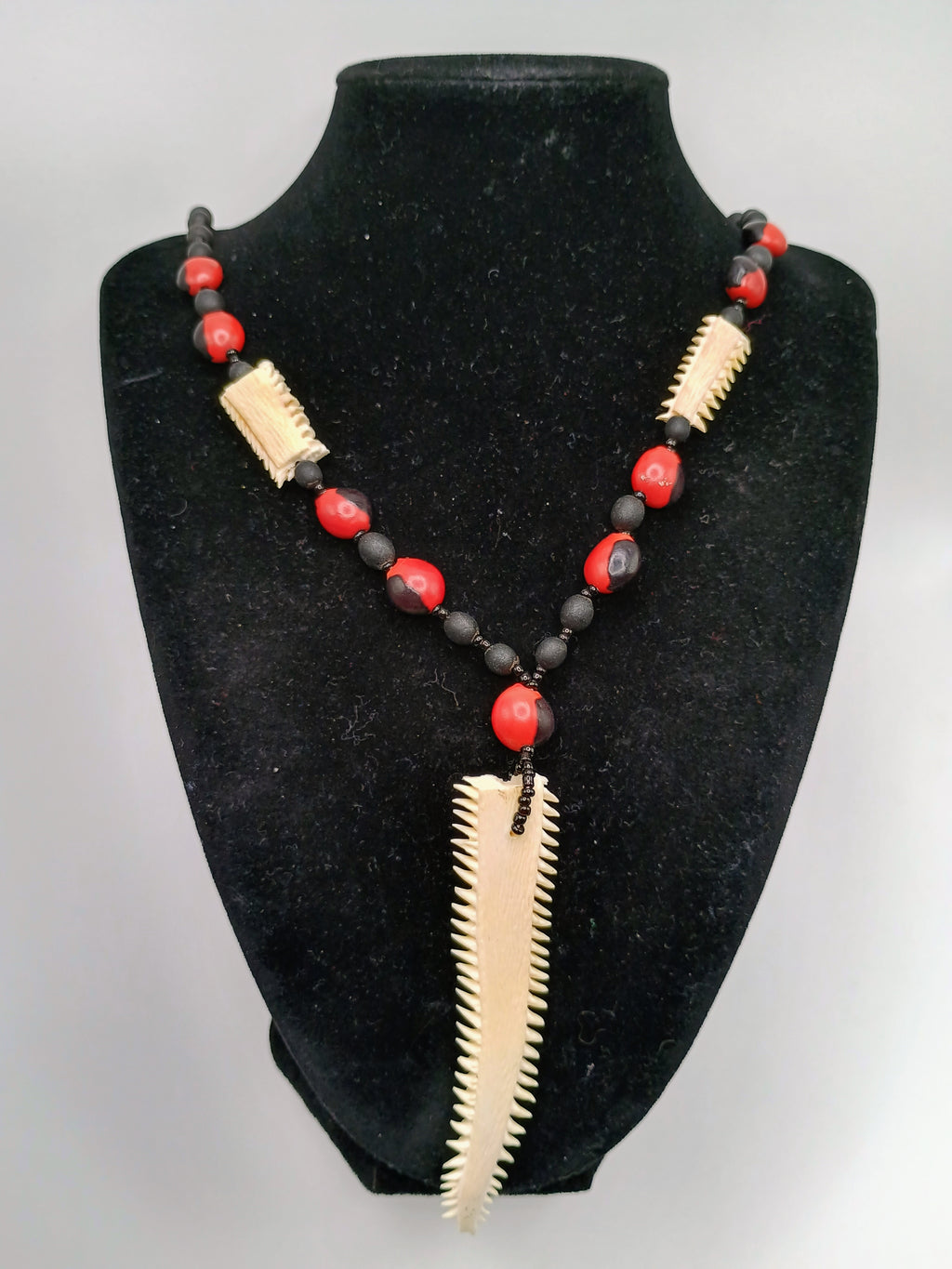 Necklace with Huayruro Seeds and Carved Bone, Handmade Amulet for Protection and Luck