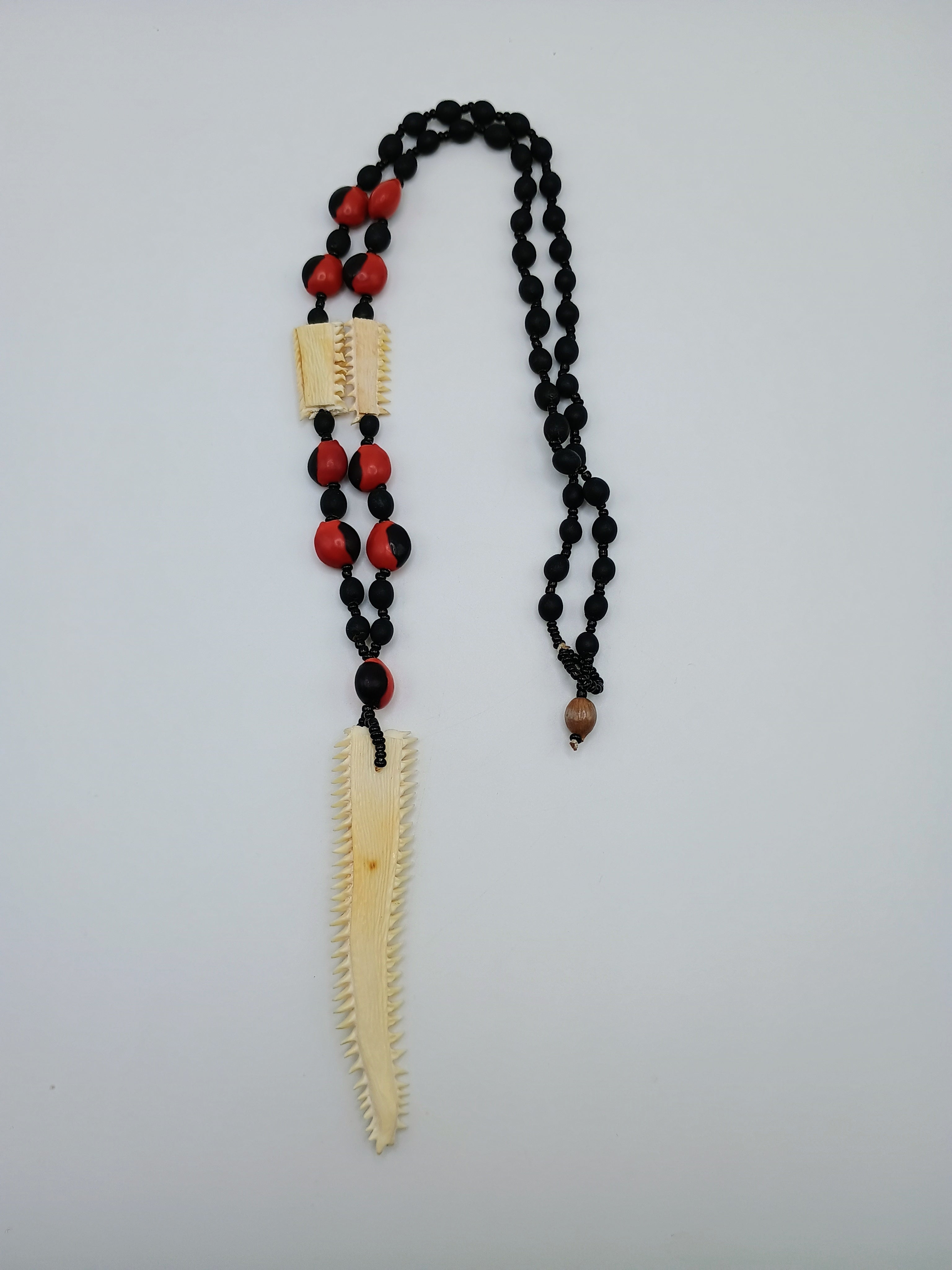 Necklace with Huayruro Seeds and Carved Bone, Handmade Amulet for Protection and Luck