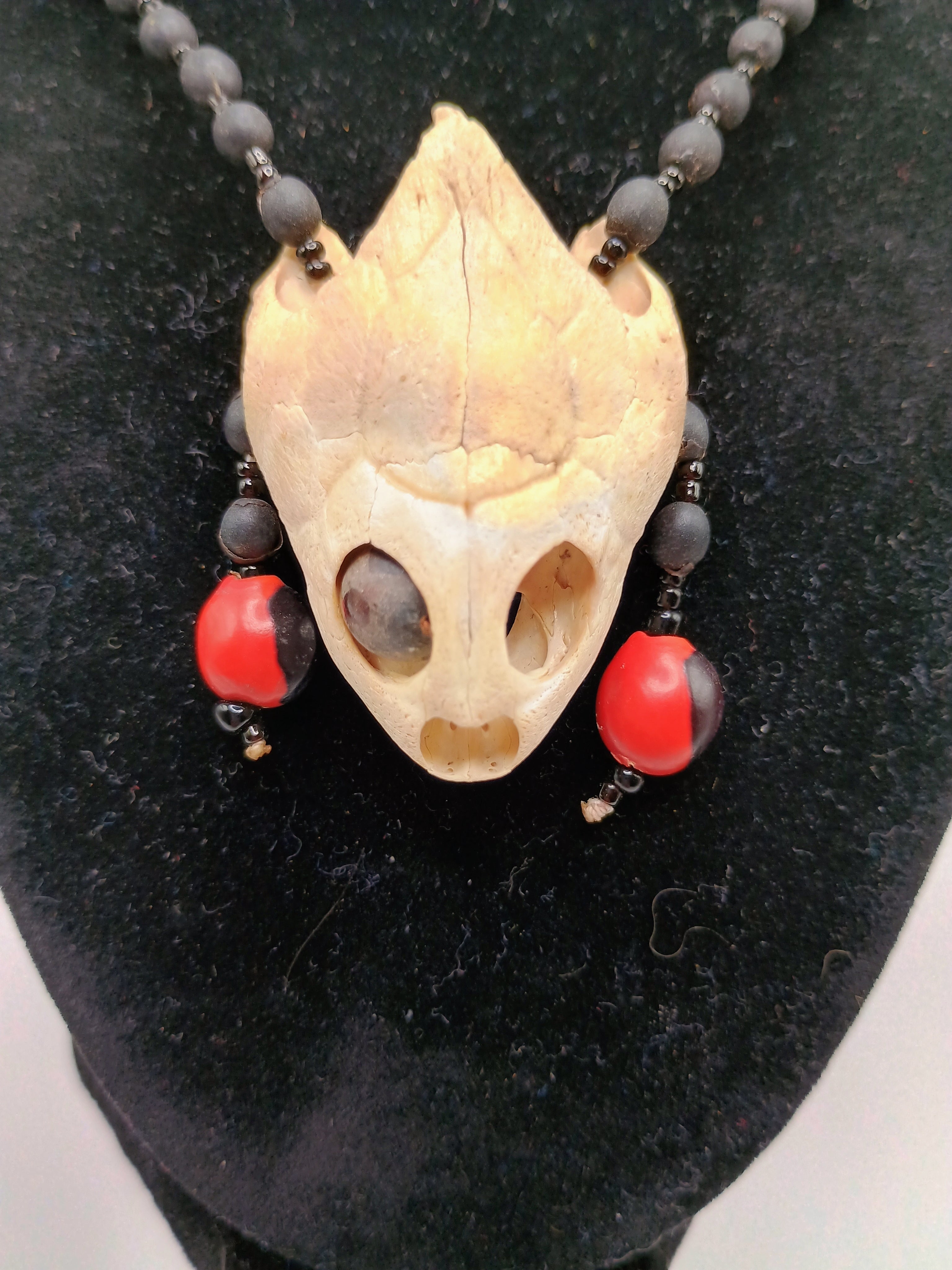 Handmade Necklace with Huayruro Seeds and a Protective Turtle Skull