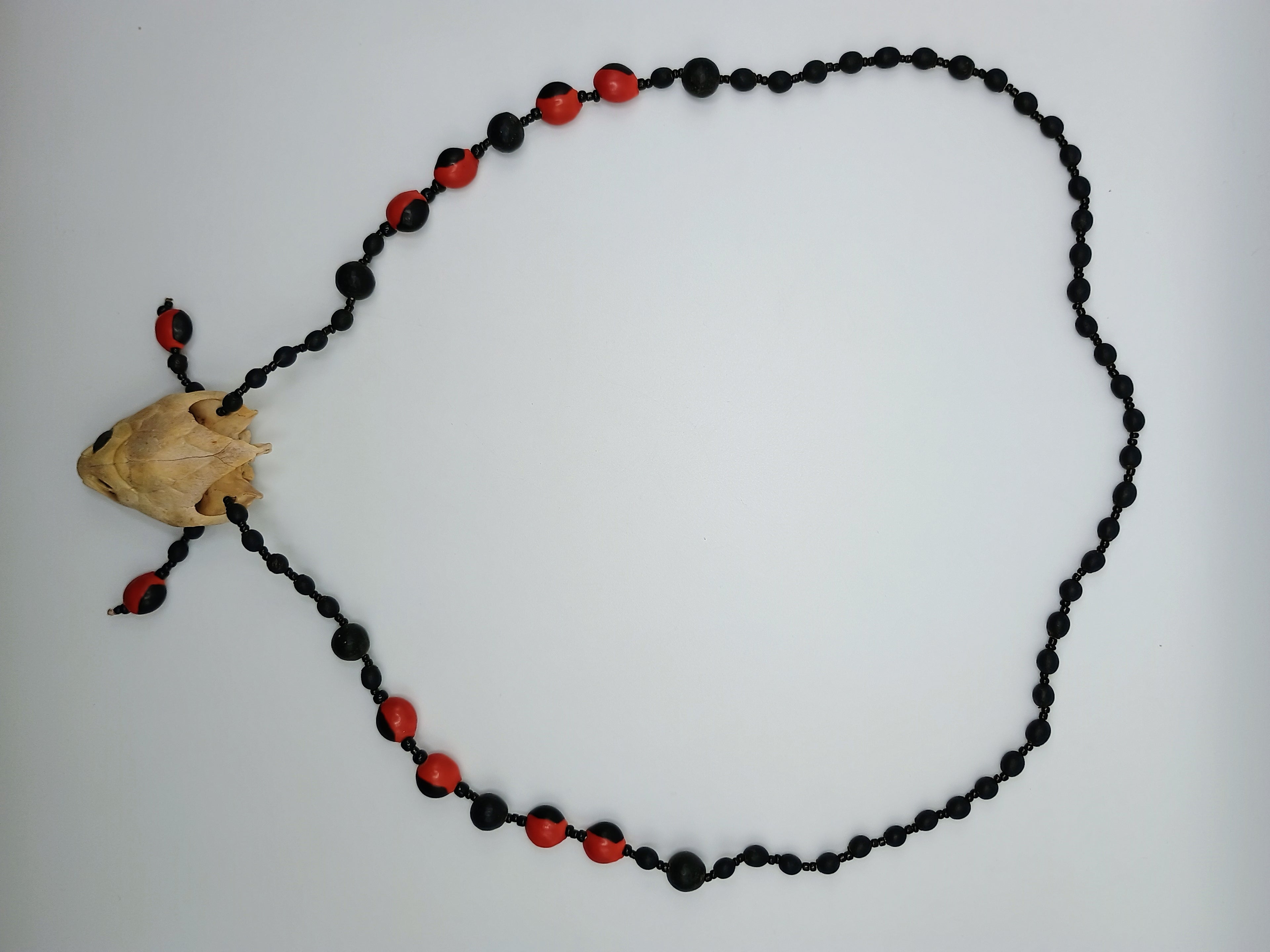 Handmade Necklace with Huayruro Seeds and a Protective Turtle Skull