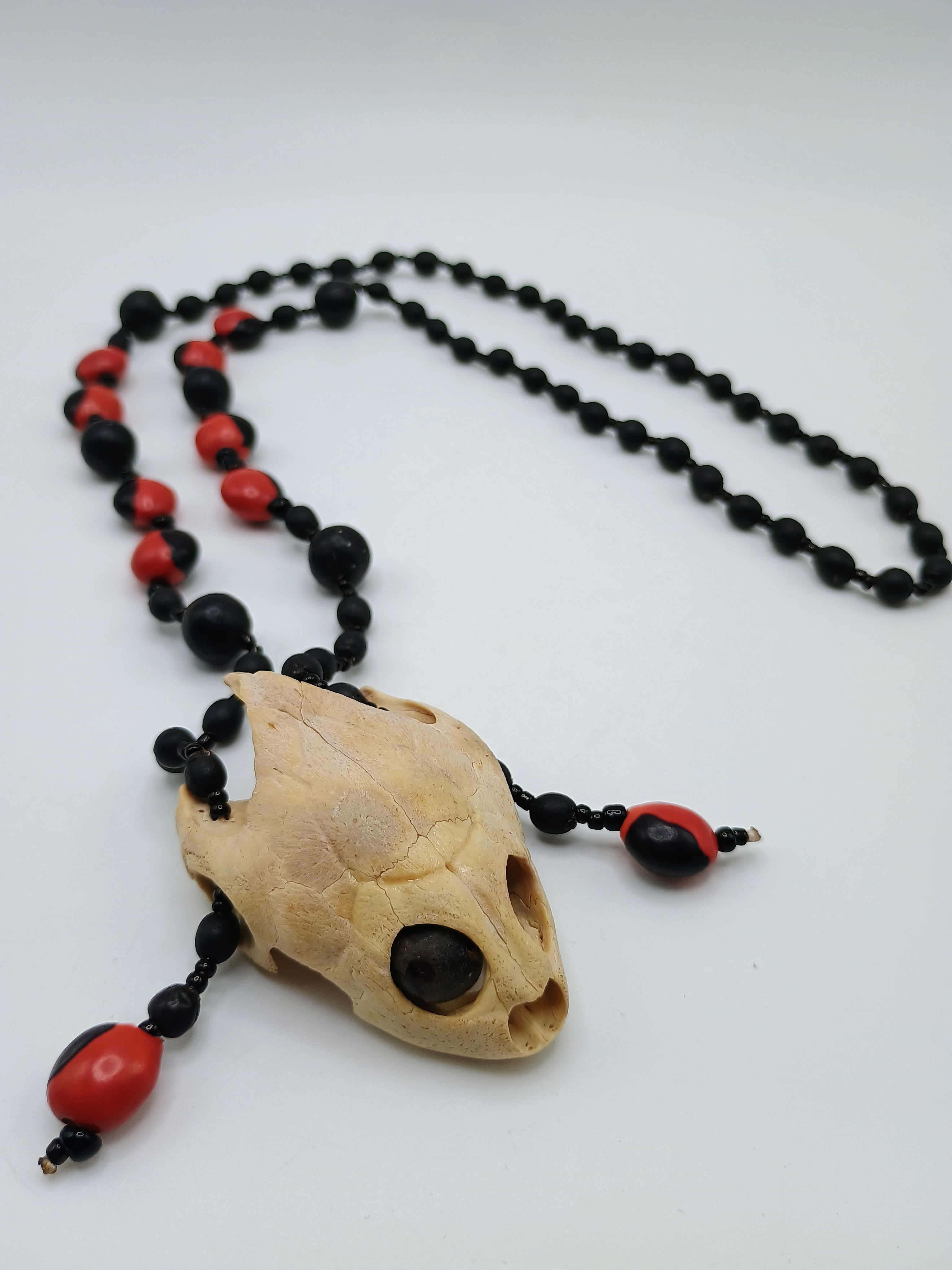 Handmade Necklace with Huayruro Seeds and a Protective Turtle Skull
