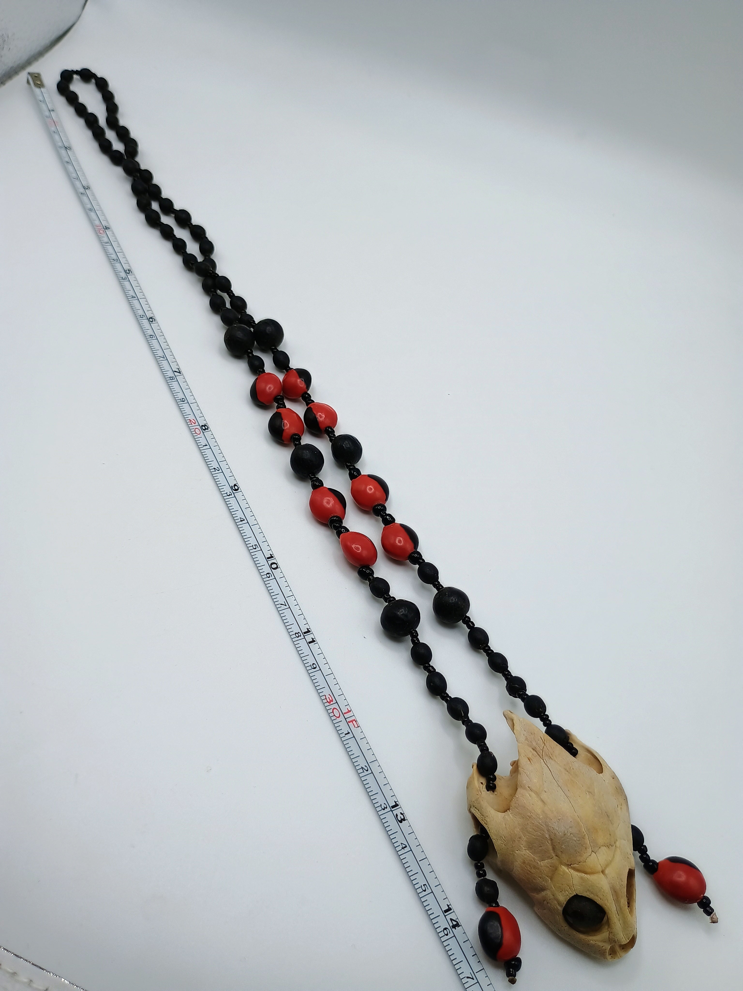 Handmade Necklace with Huayruro Seeds and a Protective Turtle Skull