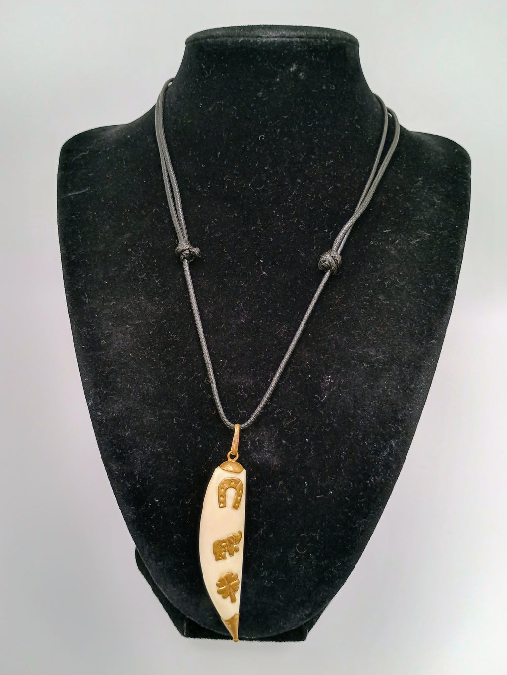 Lucky Amulet Necklace with Collected Sea Lion Bone and Golden Symbols