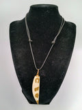 Lucky Amulet Necklace with Collected Sea Lion Bone and Golden Symbols