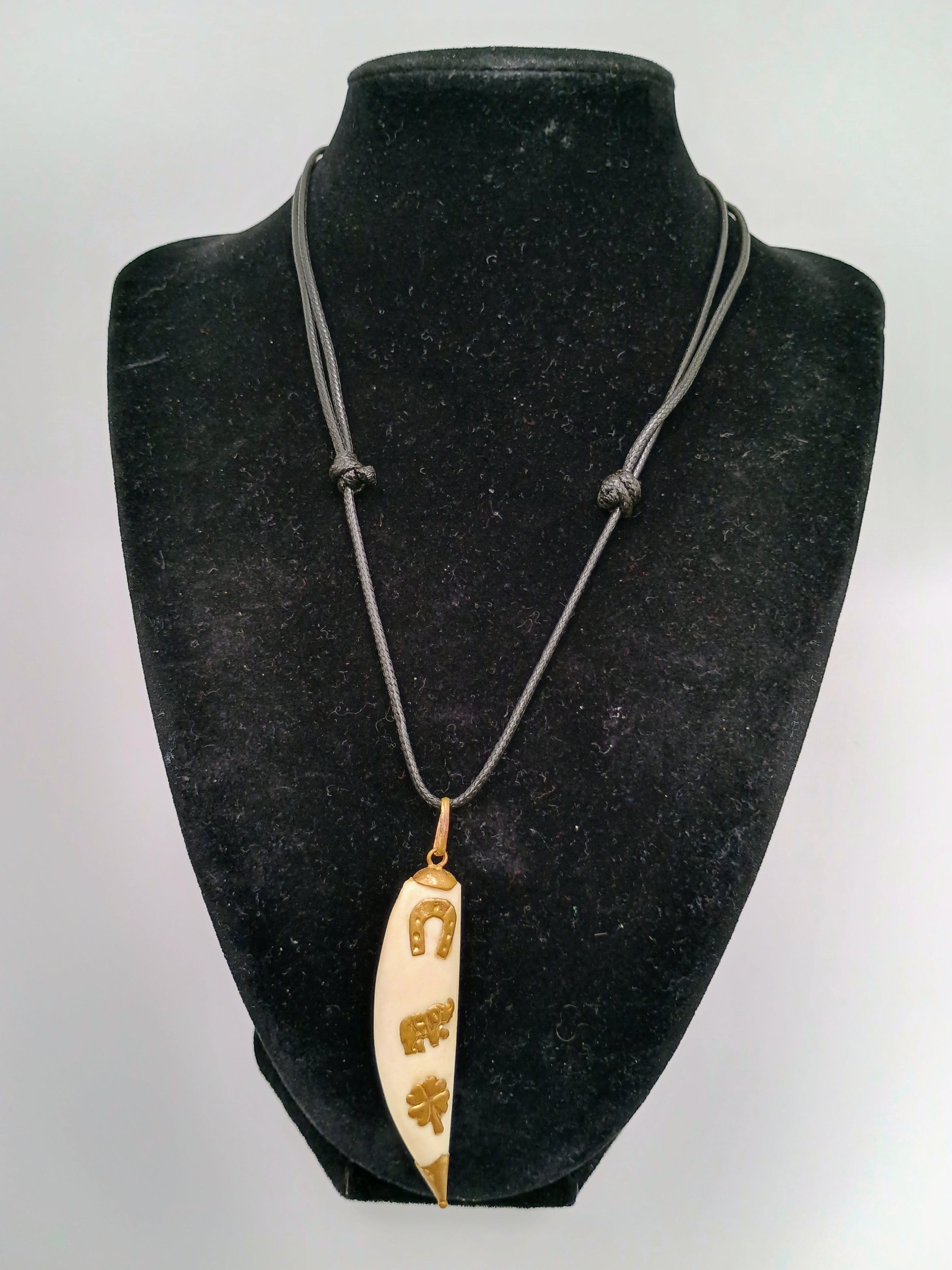 Lucky Amulet Necklace with Collected Sea Lion Bone and Golden Symbols