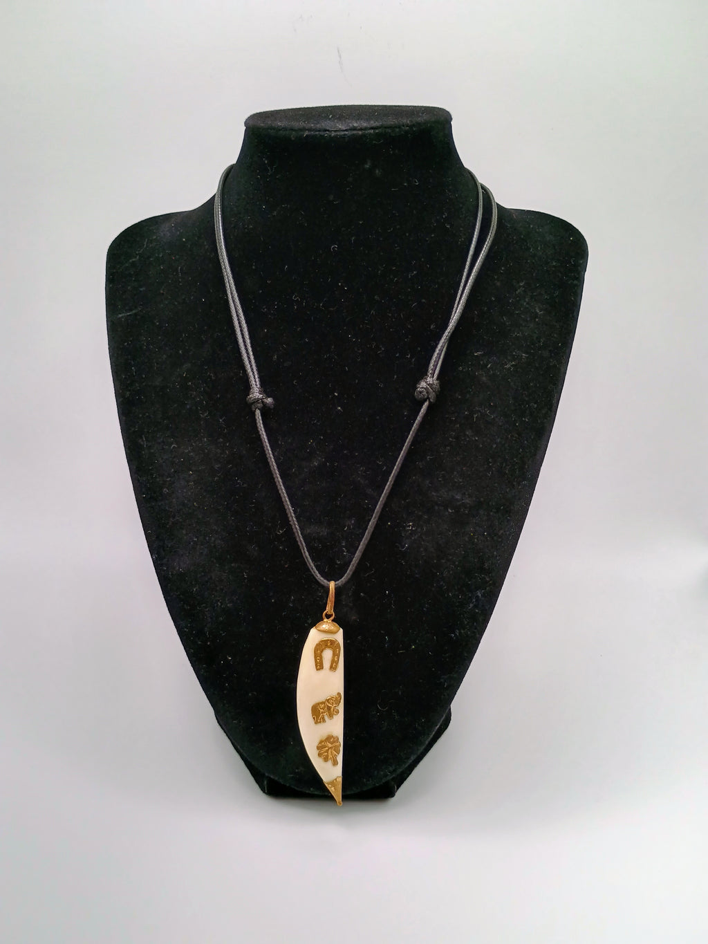 Lucky Amulet Necklace with Collected Sea Lion Bone and Golden Symbols
