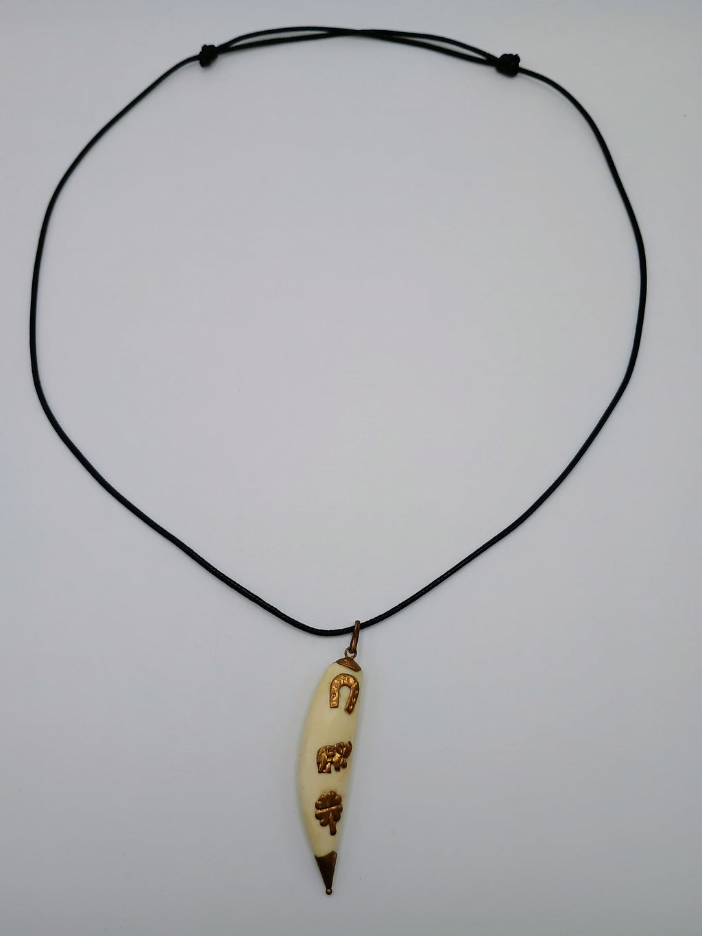Lucky Amulet Necklace with Collected Sea Lion Bone and Golden Symbols