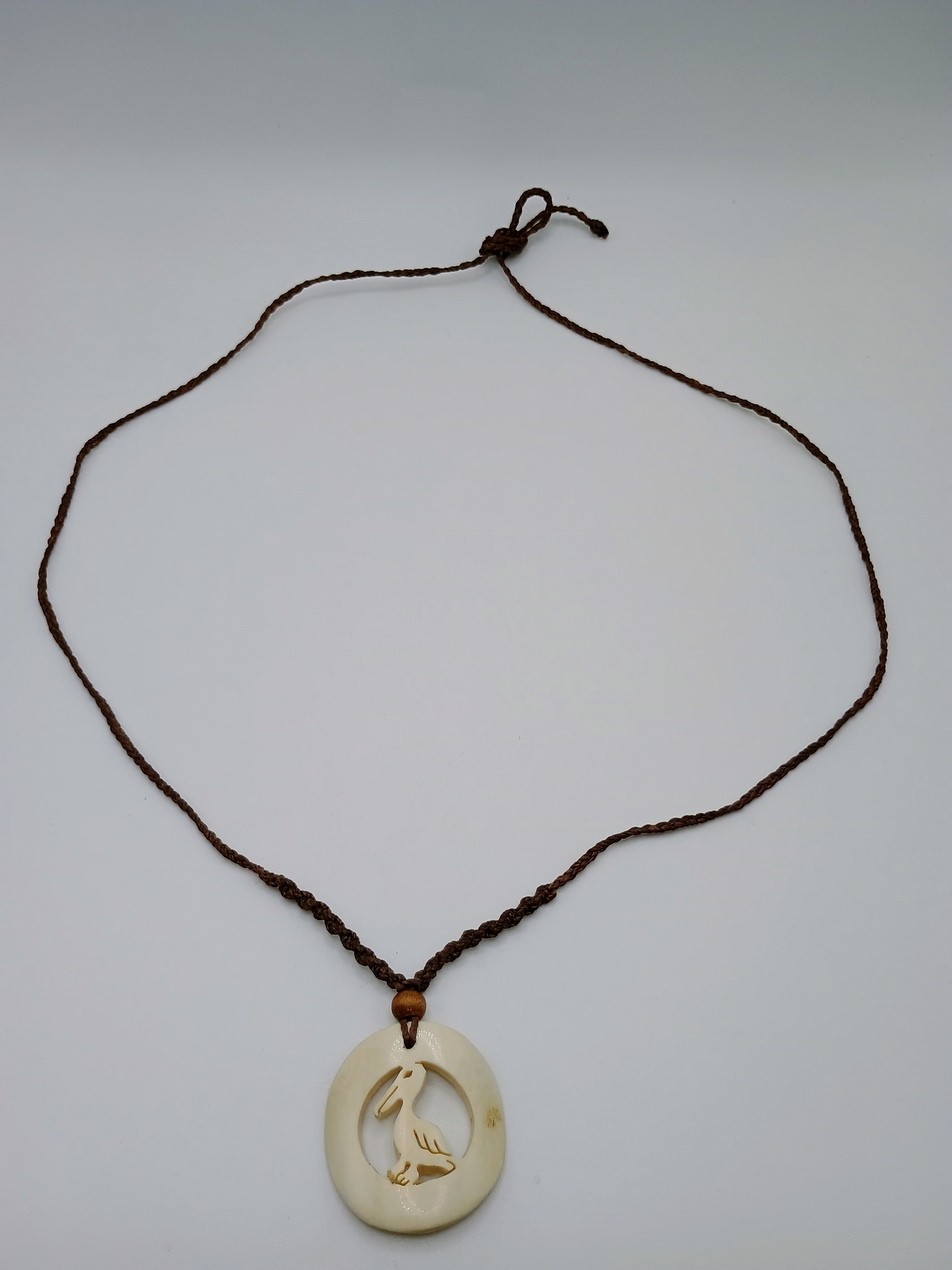 Pelican Spirit Necklace, Hand-Carved Natural Macrame