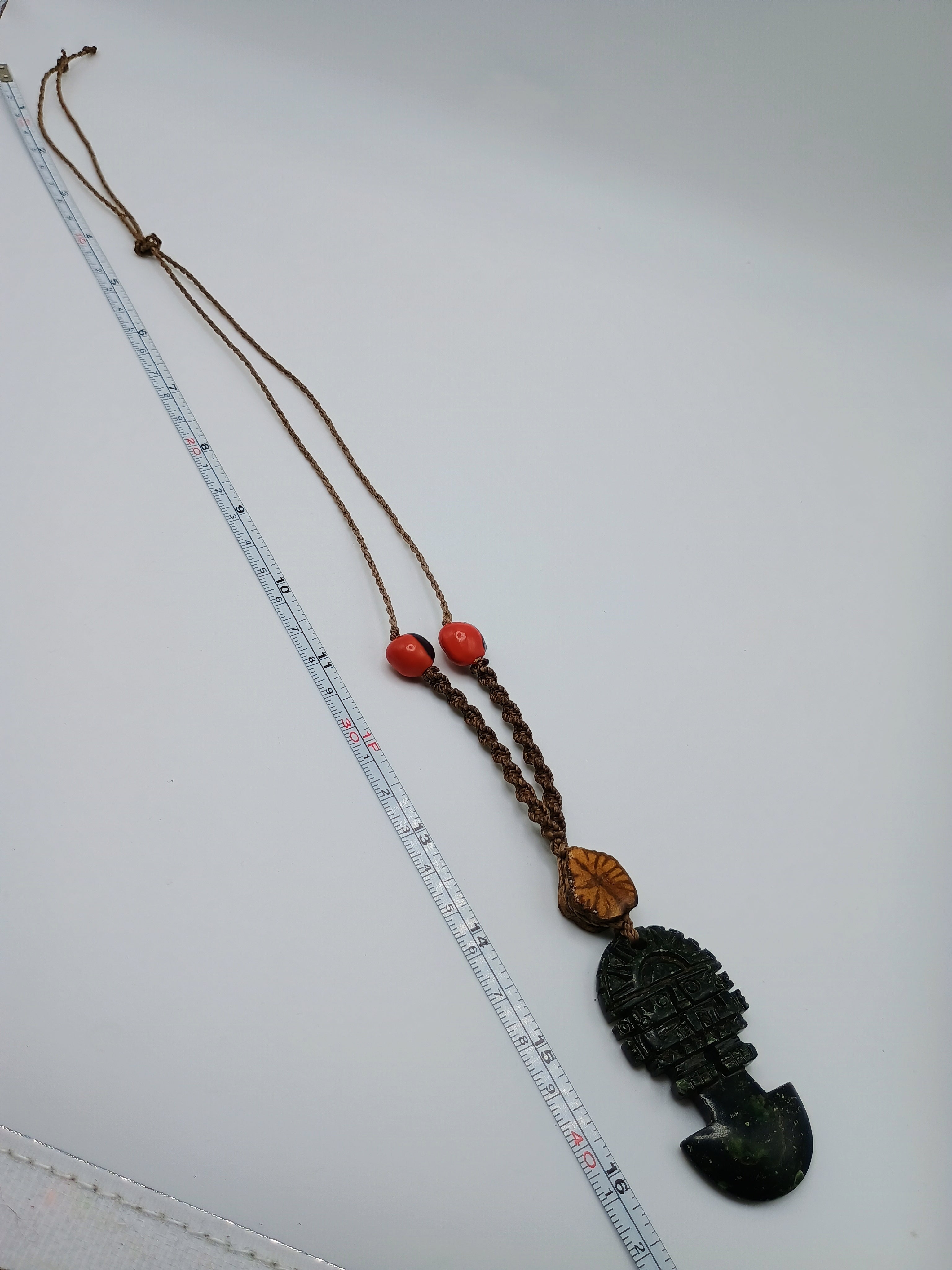 Tumi Necklace, Carved Stone, Macrame Weaving, Symbol of Protection and Luck