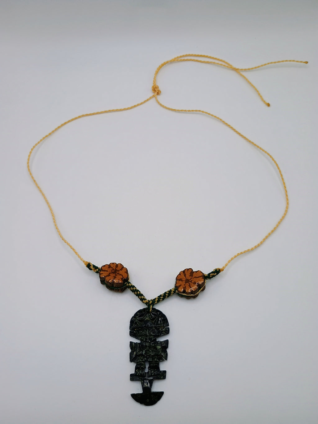 Handmade Necklace with Tumi Stone, Ayahuasca Flower, and Protective Amulet