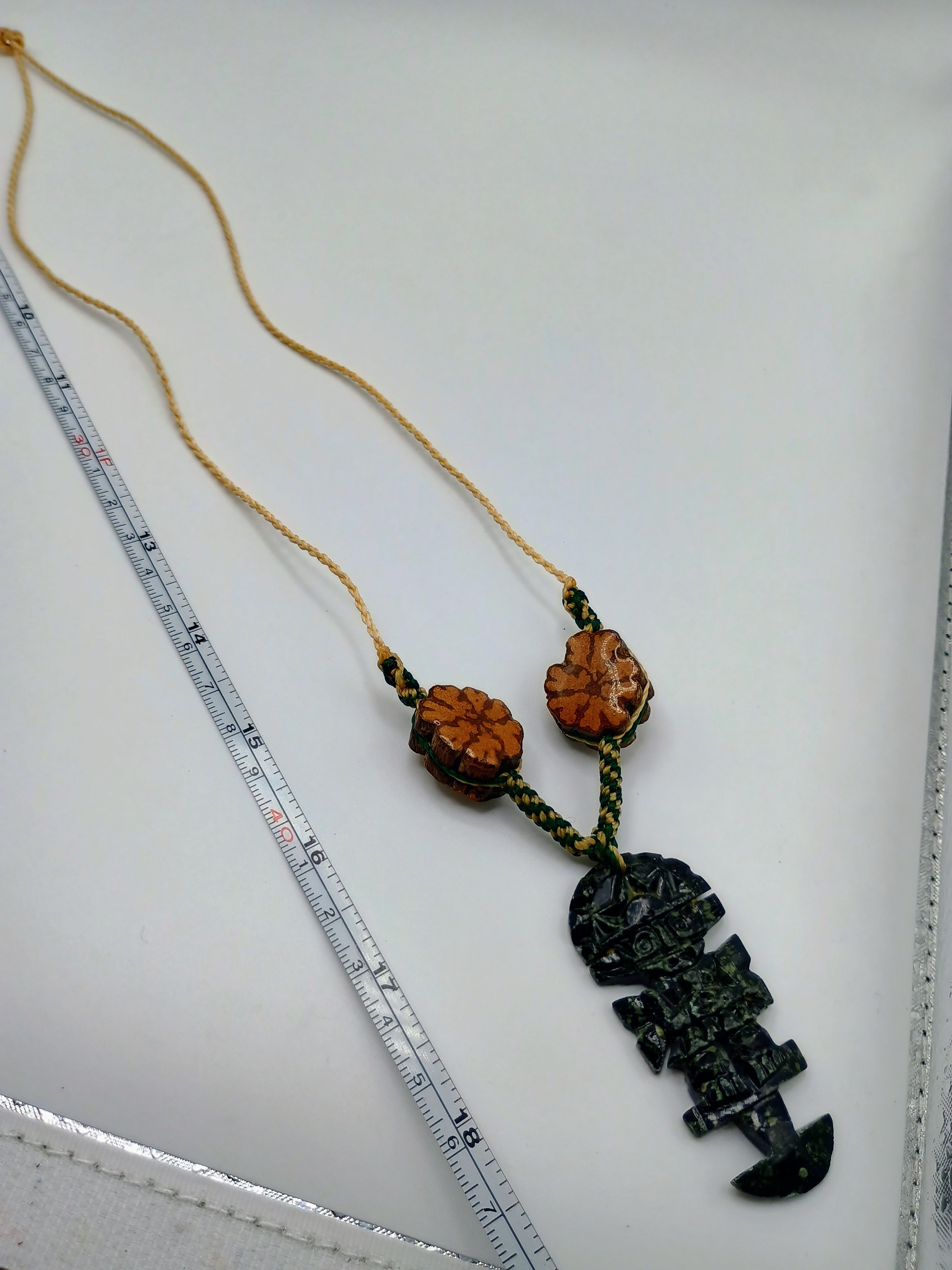 Handmade Necklace with Tumi Stone, Ayahuasca Flower, and Protective Amulet