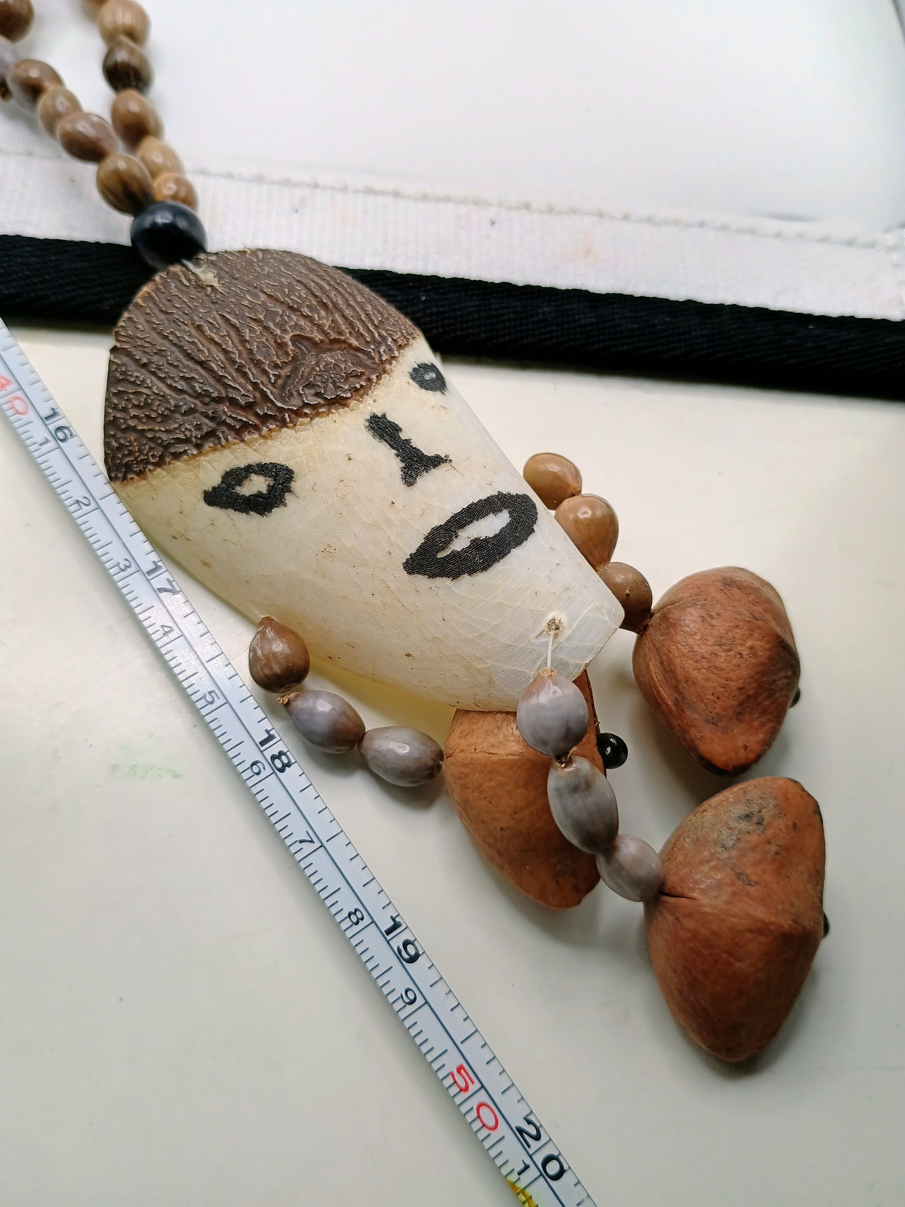 Handmade Fish Fin Necklace with Natural Seeds and Painted Face