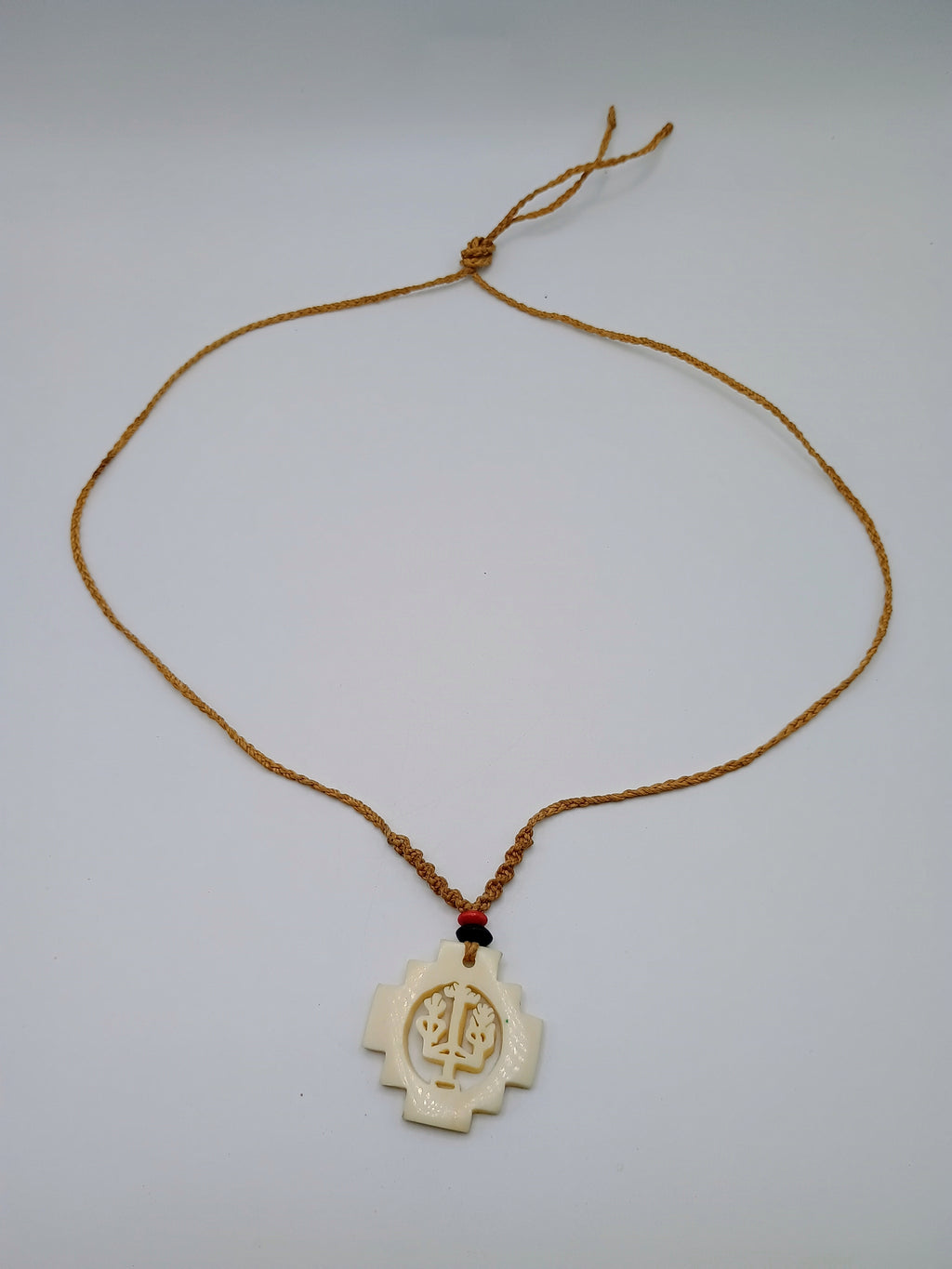Hand-carved Chakana necklace, Andean cross, macrame thread, spiritual craftsmanship