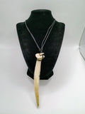 Handmade Natural Stingray Stinger Necklace with Adjustable Black Cord  Description: