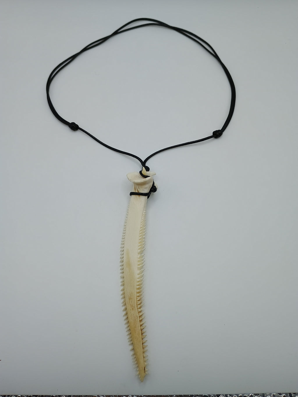 Handmade Natural Stingray Stinger Necklace with Adjustable Black Cord  Description:
