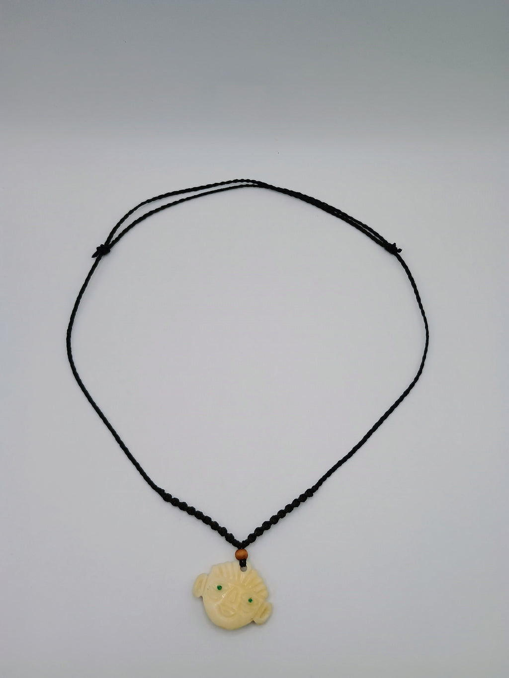 Hand-carved Tumi necklace, protection symbol, macrame cord