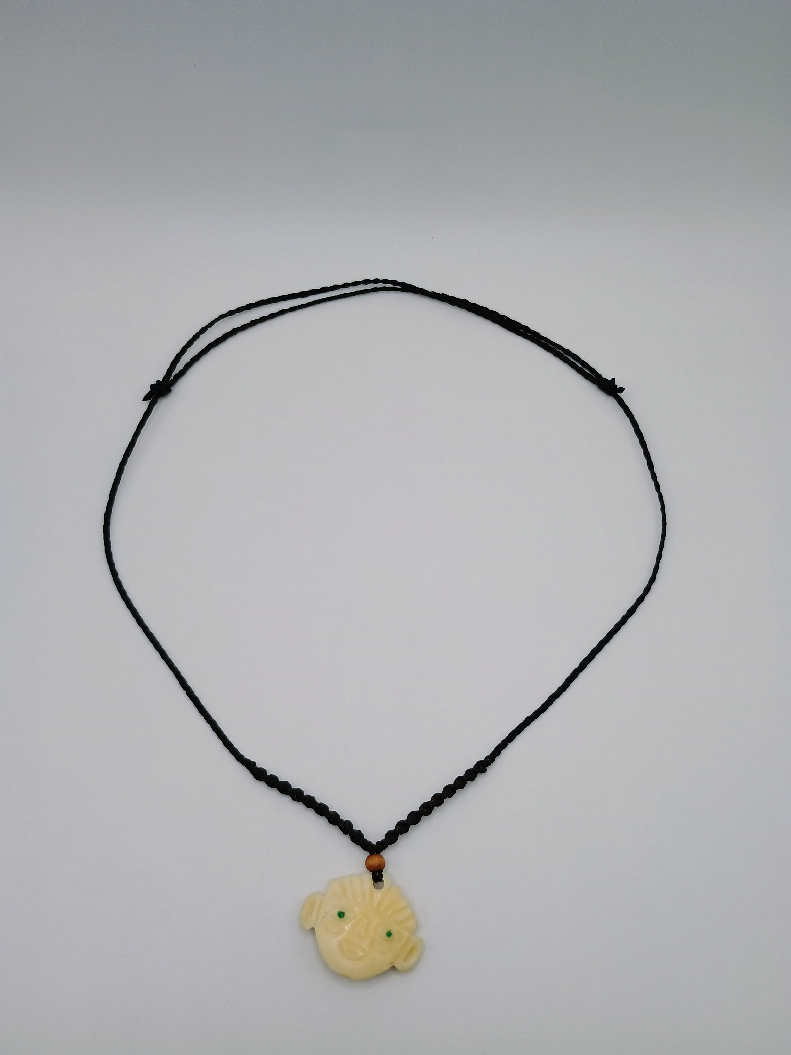Hand-carved Tumi necklace, protection symbol, macrame cord