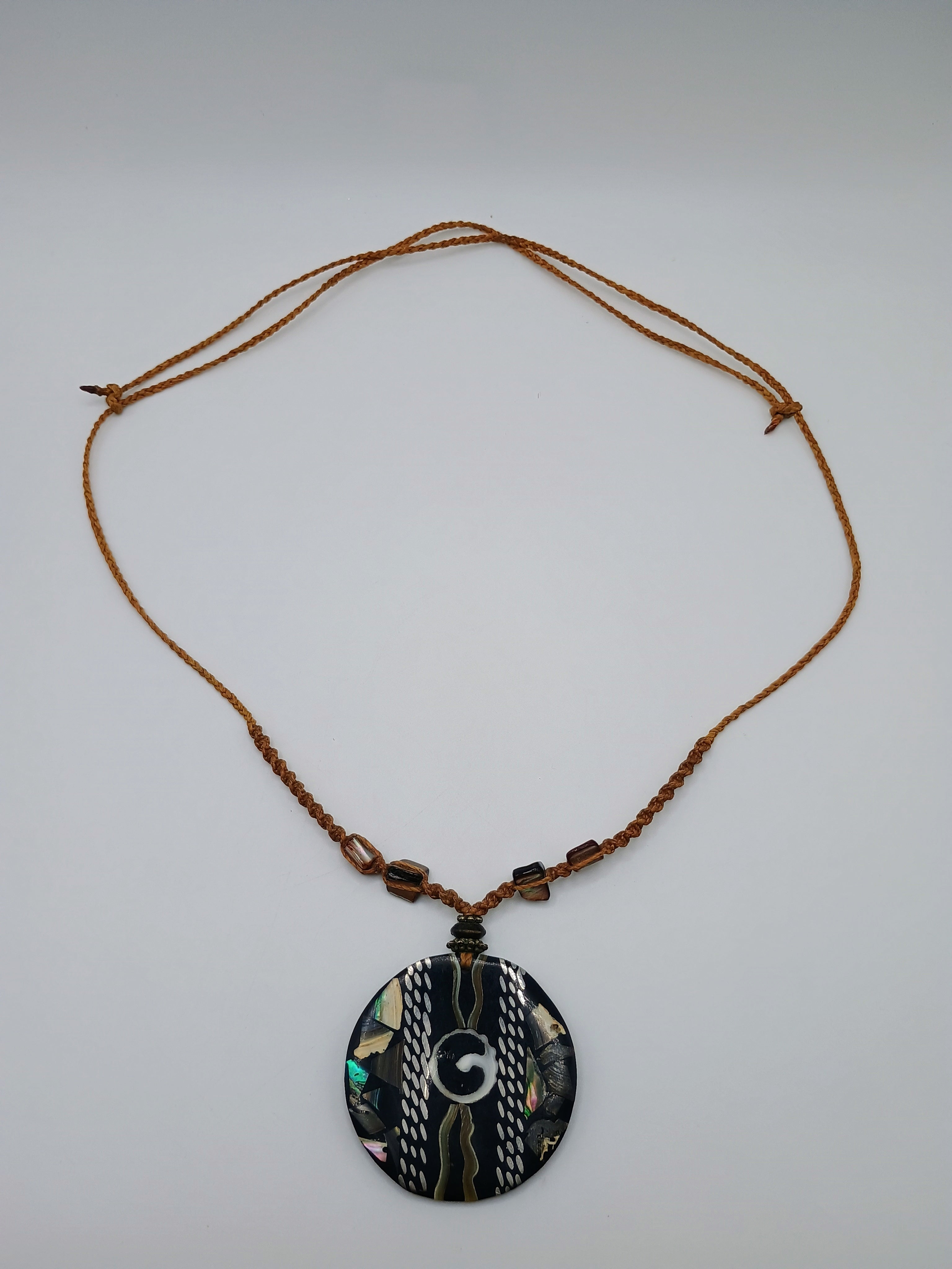 Peruvian necklace woven in macrame thread and pearlescent shell
