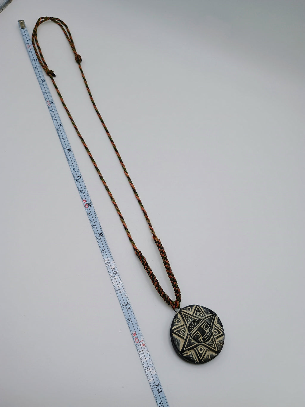 Inca Sun Necklace, Hand-Carved Stone, Peruvian Andean Pendant, Handmade Amulet