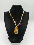 Handmade Macrame Necklace with Carved Pendant and Natural Amethyst Stones