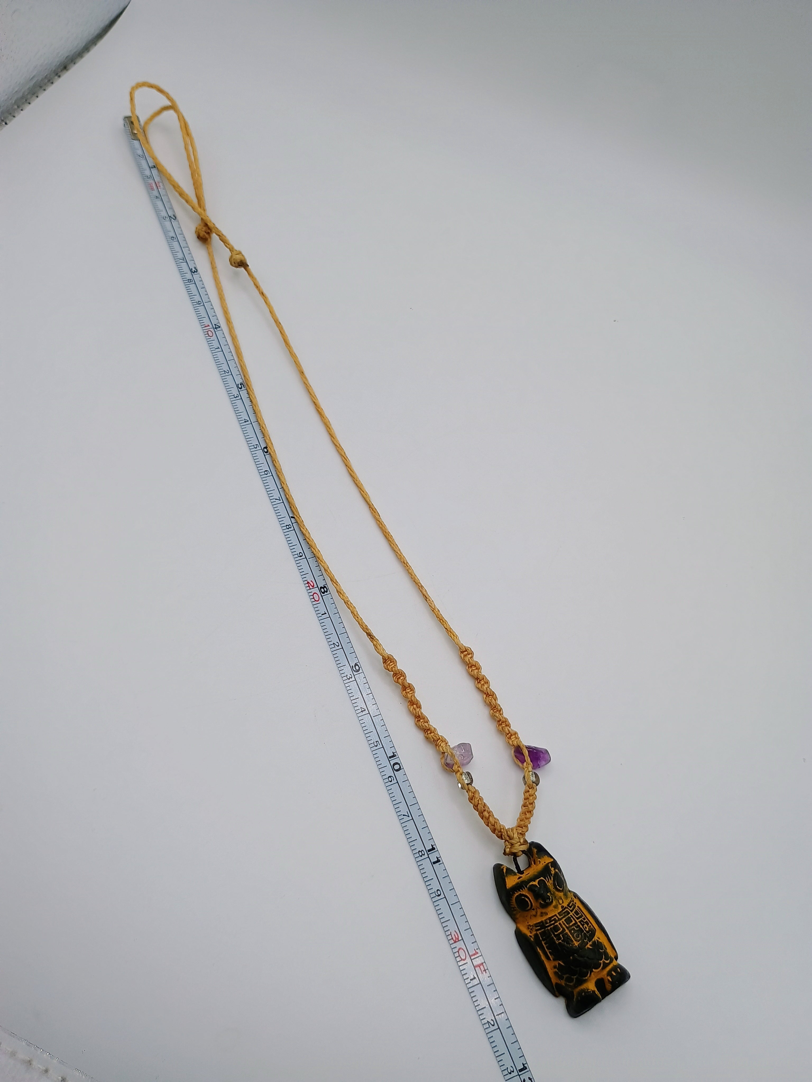 Handmade Macrame Necklace with Carved Pendant and Natural Amethyst Stones