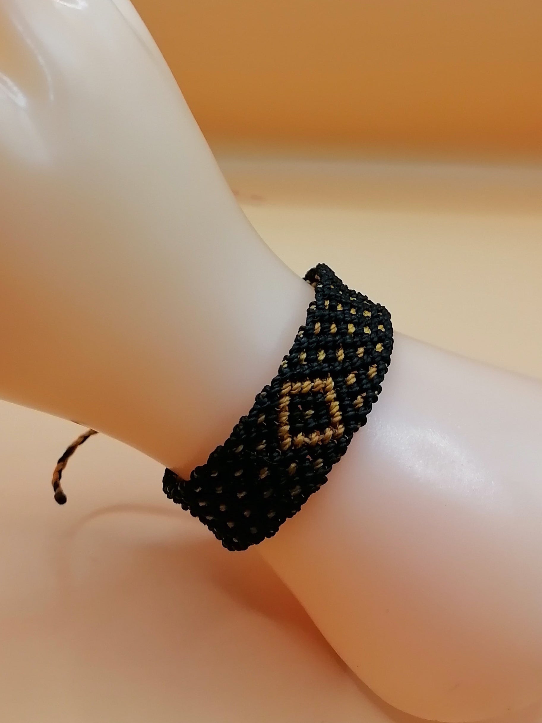 Black Macrame Bracelet with Golden Geometric Designs, Hand-Woven Bracelet