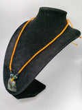 Hand-woven Macrame Necklace Pendant with Chavín Clave Head Stone