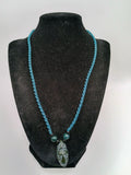 Macrame Necklace with Inca Mask Carved from Natural Andean Stone