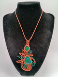 Eye-catching Macrame Necklace with Natural Turquoise Stones.