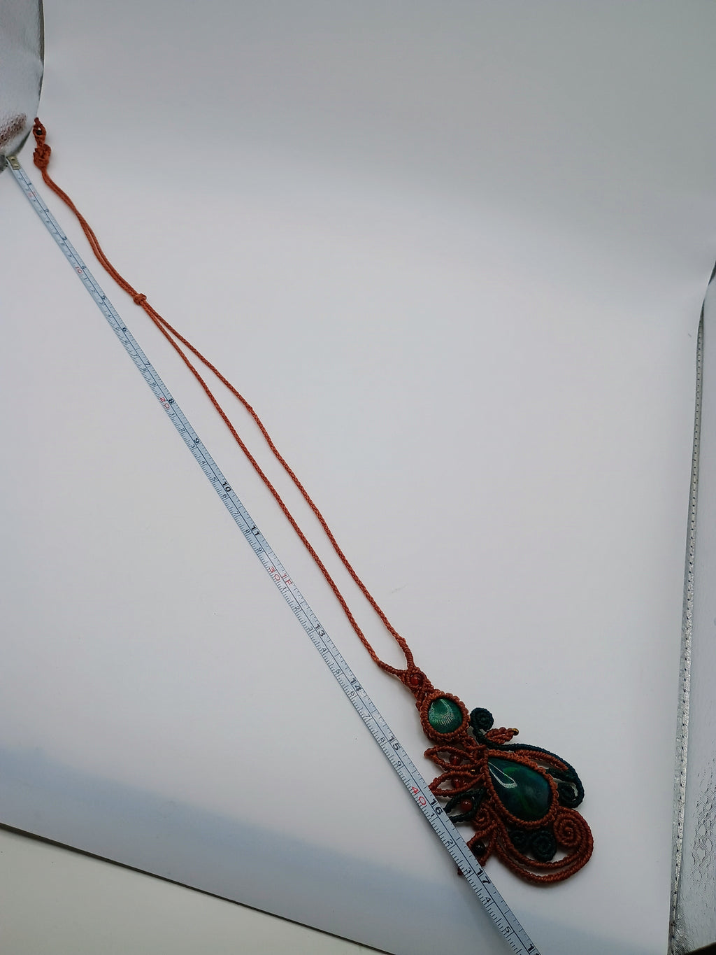 Eye-catching Macrame Necklace with Natural Turquoise Stones.