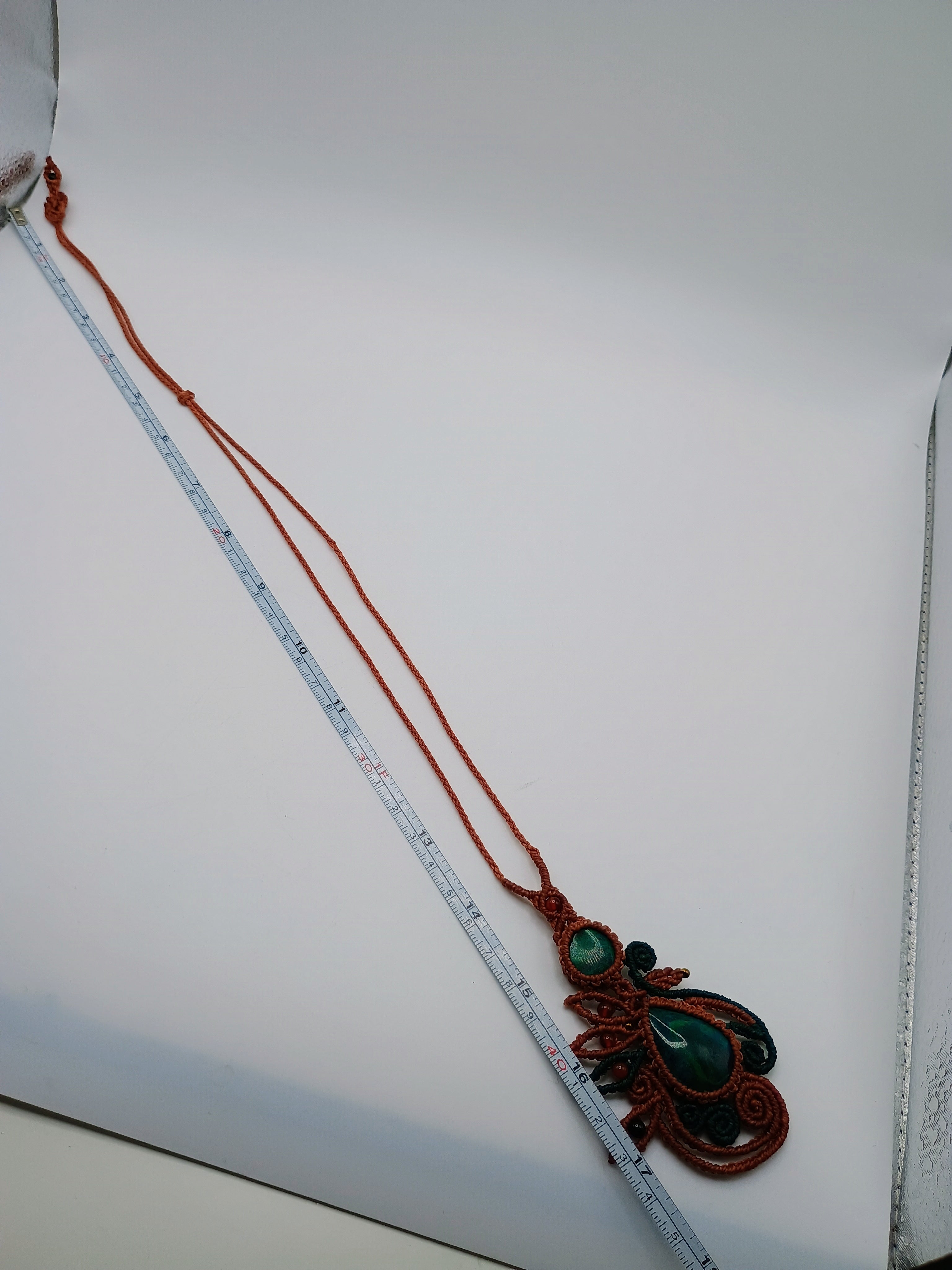 Eye-catching Macrame Necklace with Natural Turquoise Stones.