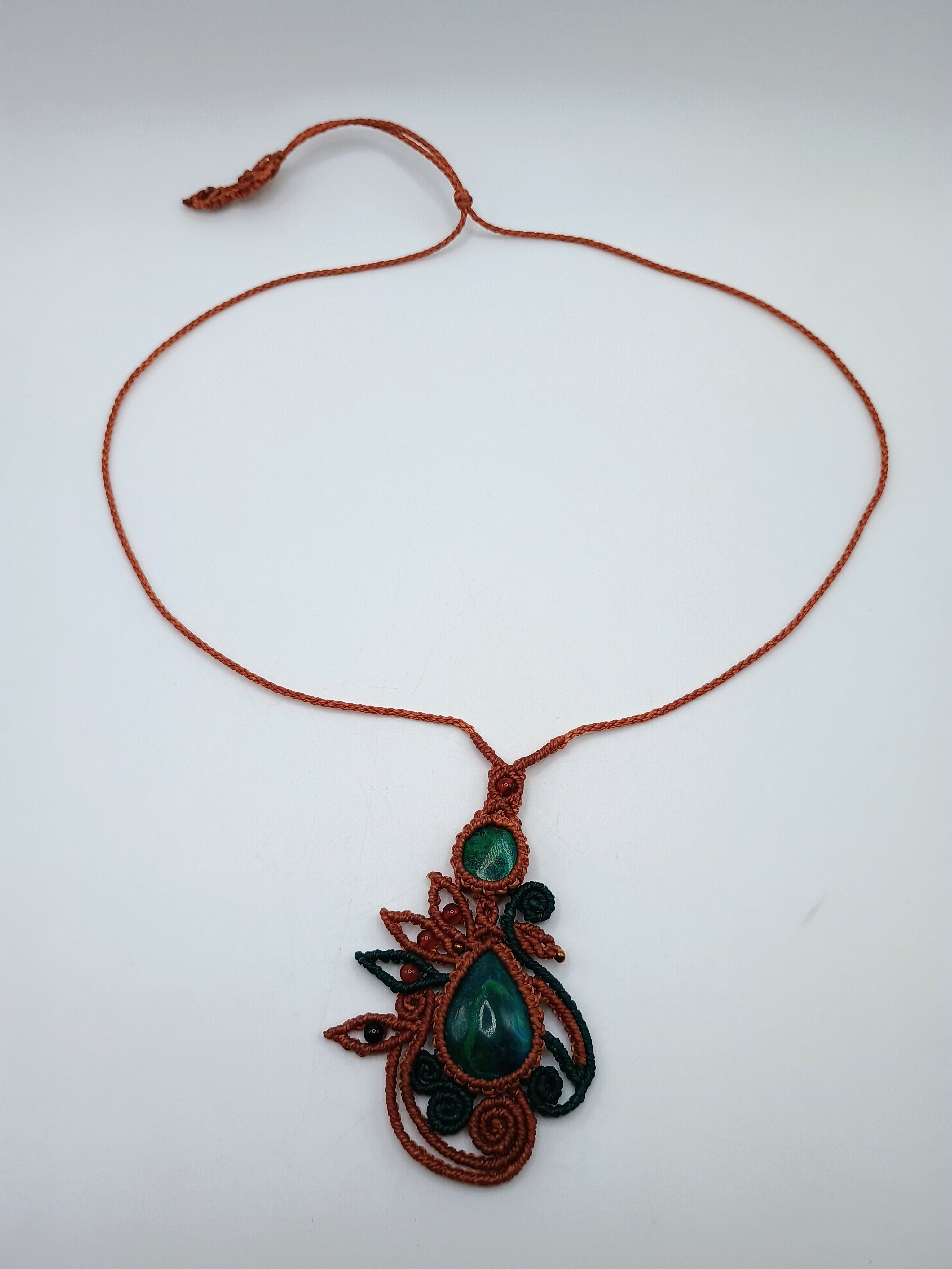 Eye-catching Macrame Necklace with Natural Turquoise Stones.